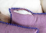 Funda de cojín pana 30x50 cm con madroños. Varios Colores a Escoger